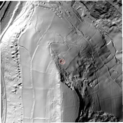 Shaded relief map of the ground around NP254LX, computed from Environment Agency LiDAR. The ground here sits at about 118 m above sea level and falls 155 m across the surrounding 800 m. Surface water reaching this point runs off ground lying to the south-west, 18.4 m higher.