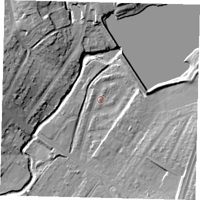 Shaded relief map of the ground around NW100DN, computed from Environment Agency LiDAR. The ground here sits at about 33 m above sea level and falls 16 m across the surrounding 800 m. Surface water reaching this point runs off ground lying to the east-north-east, 7.8 m higher.