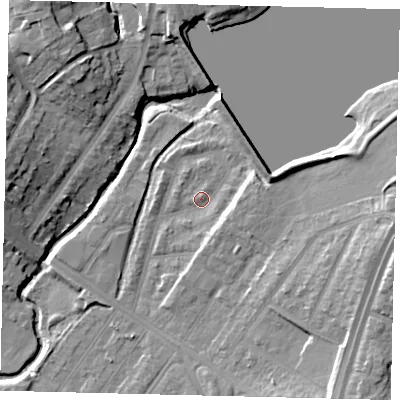 Shaded relief map of the ground around NW100DT, computed from Environment Agency LiDAR. The ground here sits at about 33 m above sea level and falls 17 m across the surrounding 800 m. Surface water reaching this point runs off ground lying to the east-north-east, 7.8 m higher.