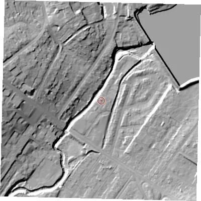 Shaded relief map of the ground around NW100EJ, computed from Environment Agency LiDAR. The ground here sits at about 32 m above sea level and falls 21 m across the surrounding 800 m. Surface water reaching this point runs off ground lying to the west-north-west, 20.5 m higher.