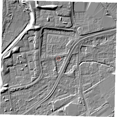 Shaded relief map of the ground around NW100PG, computed from Environment Agency LiDAR. The ground here sits at about 29 m above sea level and falls 11 m across the surrounding 800 m. Surface water reaching this point runs off ground lying to the east-north-east, 1.3 m higher.