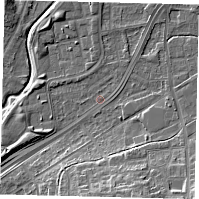 Shaded relief map of the ground around NW100PJ, computed from Environment Agency LiDAR. The ground here sits at about 28 m above sea level and falls 16 m across the surrounding 800 m. Surface water reaching this point runs off ground lying to the north-east, 3.3 m higher.