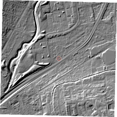 Shaded relief map of the ground around NW100PN, computed from Environment Agency LiDAR. The ground here sits at about 26 m above sea level and falls 21 m across the surrounding 800 m. Surface water reaching this point runs off ground lying to the north-north-east, 3.2 m higher.