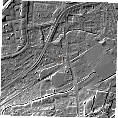 Shaded relief map of the ground around NW100QG, computed from Environment Agency LiDAR. The ground here sits at about 29 m above sea level and falls 11 m across the surrounding 800 m. Surface water reaching this point runs off ground lying to the east, 1.4 m higher.