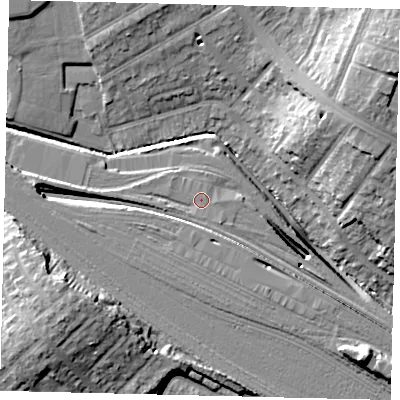 Shaded relief map of the ground around NW100RW, computed from Environment Agency LiDAR. The ground here sits at about 33 m above sea level and falls 23 m across the surrounding 800 m. Surface water reaching this point runs off ground lying to the west, 1.5 m higher.