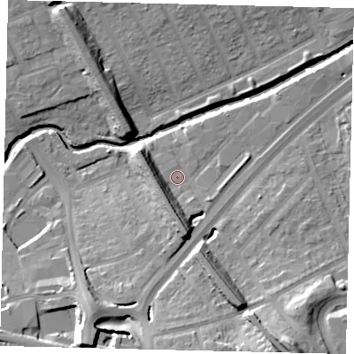 Shaded relief map of the ground around NW107XH, computed from Environment Agency LiDAR. The ground here sits at about 25 m above sea level and falls 24 m across the surrounding 800 m. Surface water reaching this point runs off ground lying to the south, 9.1 m higher.