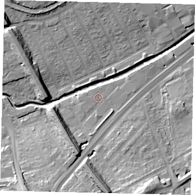 Shaded relief map of the ground around NW107XR, computed from Environment Agency LiDAR. The ground here sits at about 24 m above sea level and falls 19 m across the surrounding 800 m. Surface water reaching this point runs off ground lying to the south, 3.1 m higher.