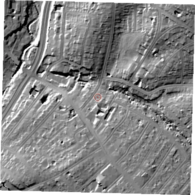 Shaded relief map of the ground around NW110JP, computed from Environment Agency LiDAR. The ground here sits at about 50 m above sea level and falls 32 m across the surrounding 800 m. Surface water reaching this point runs off ground lying to the south, 6.5 m higher.