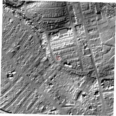 Shaded relief map of the ground around NW110RP, computed from Environment Agency LiDAR. The ground here sits at about 58 m above sea level and falls 23 m across the surrounding 800 m. Surface water reaching this point runs off ground lying to the east, 6.6 m higher.
