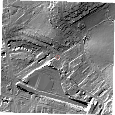 Shaded relief map of the ground around NW117BX, computed from Environment Agency LiDAR. The ground here sits at about 70 m above sea level and falls 30 m across the surrounding 800 m. Surface water reaching this point runs off ground lying to the south-east, 9.4 m higher.