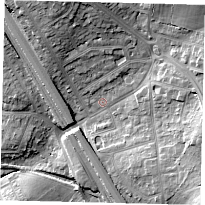 Shaded relief map of the ground around NW73DA, computed from Environment Agency LiDAR. The ground here sits at about 65 m above sea level and falls 22 m across the surrounding 800 m. Surface water reaching this point runs off ground lying to the north-east, 4.5 m higher.