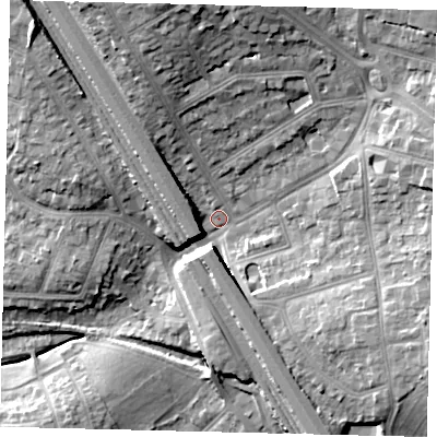 Shaded relief map of the ground around NW73LN, computed from Environment Agency LiDAR. The ground here sits at about 64 m above sea level and falls 20 m across the surrounding 800 m. Surface water reaching this point runs off ground lying to the north-north-west, 16.5 m higher.