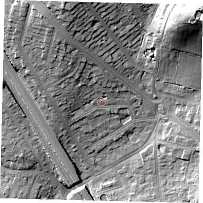 Shaded relief map of the ground around NW73QN, computed from Environment Agency LiDAR. The ground here sits at about 72 m above sea level and falls 39 m across the surrounding 800 m. Surface water reaching this point runs off ground lying to the north, 7.4 m higher.