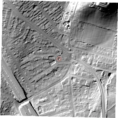 Shaded relief map of the ground around NW73RH, computed from Environment Agency LiDAR. The ground here sits at about 69 m above sea level and falls 41 m across the surrounding 800 m. Surface water reaching this point runs off ground lying to the north-west, 8.3 m higher.