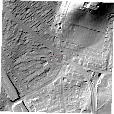 Shaded relief map of the ground around NW74RN, computed from Environment Agency LiDAR. The ground here sits at about 70 m above sea level and falls 44 m across the surrounding 800 m. Surface water reaching this point runs off ground lying to the north-west, 15.8 m higher.