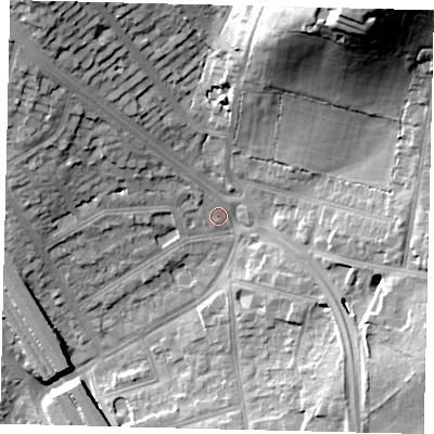 Shaded relief map of the ground around NW74TD, computed from Environment Agency LiDAR. The ground here sits at about 70 m above sea level and falls 42 m across the surrounding 800 m. Surface water reaching this point runs off ground lying to the north-west, 16.1 m higher.
