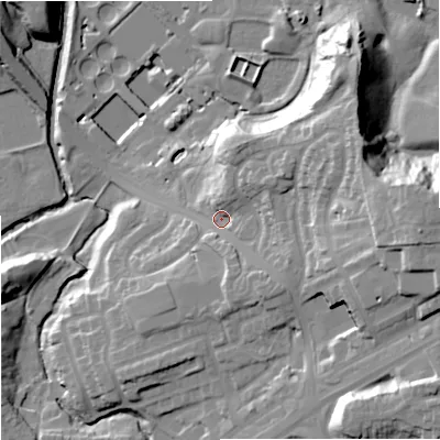 Shaded relief map of the ground around OL114QH, computed from Environment Agency LiDAR. The ground here sits at about 121 m above sea level and falls 38 m across the surrounding 800 m. Surface water reaching this point runs off ground lying to the east, 25.0 m higher.