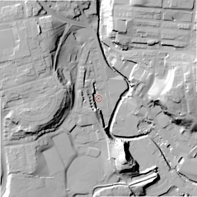Shaded relief map of the ground around OL115AT, computed from Environment Agency LiDAR. The ground here sits at about 122 m above sea level and falls 36 m across the surrounding 800 m. Surface water reaching this point runs off ground lying to the north-west, 28.7 m higher.