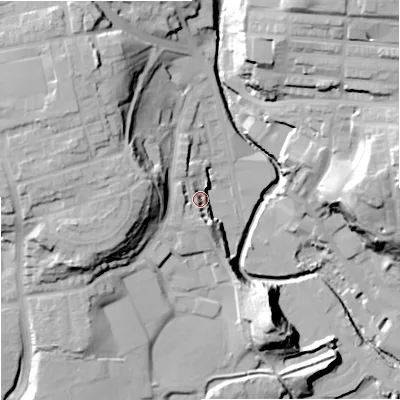 Shaded relief map of the ground around OL115BN, computed from Environment Agency LiDAR. The ground here sits at about 128 m above sea level and falls 36 m across the surrounding 800 m. Surface water reaching this point runs off ground lying to the west-south-west, 10.2 m higher.