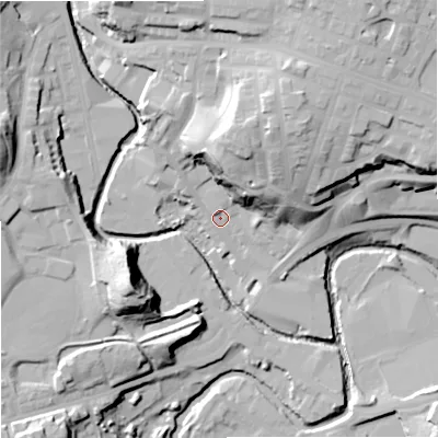 Shaded relief map of the ground around OL126AQ, computed from Environment Agency LiDAR. The ground here sits at about 121 m above sea level and falls 36 m across the surrounding 800 m. Surface water reaching this point runs off ground lying to the north-north-east, 24.6 m higher.