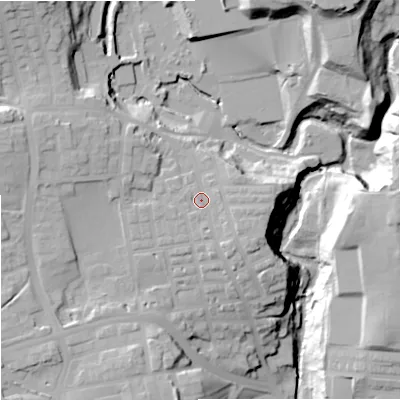 Shaded relief map of the ground around OL127DQ, computed from Environment Agency LiDAR. The ground here sits at about 145 m above sea level and falls 37 m across the surrounding 800 m. Surface water reaching this point runs off ground lying to the east, 3.6 m higher.