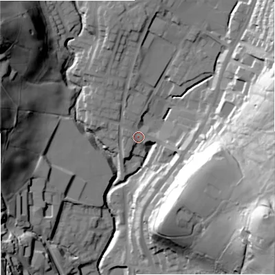 Shaded relief map of the ground around OL128AA, computed from Environment Agency LiDAR. The ground here sits at about 220 m above sea level and falls 66 m across the surrounding 800 m. Surface water reaching this point runs off ground lying to the east-south-east, 59.4 m higher.