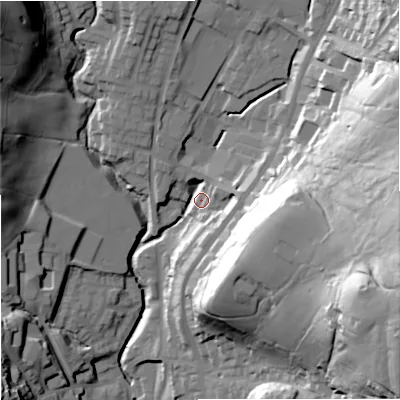 Shaded relief map of the ground around OL128AJ, computed from Environment Agency LiDAR. The ground here sits at about 219 m above sea level and falls 70 m across the surrounding 800 m. Surface water reaching this point runs off ground lying to the east-south-east, 64.4 m higher.