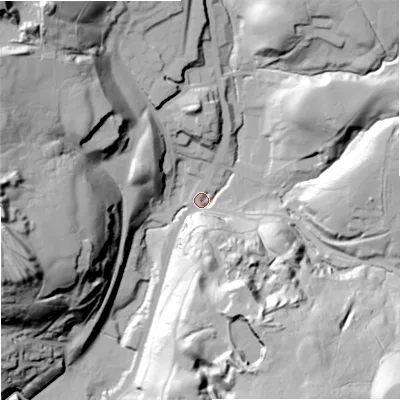 Shaded relief map of the ground around OL128EG, computed from Environment Agency LiDAR. The ground here sits at about 257 m above sea level and falls 72 m across the surrounding 800 m. Surface water reaching this point runs off ground lying to the south-east, 57.3 m higher.