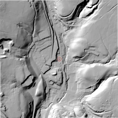 Shaded relief map of the ground around OL128HF, computed from Environment Agency LiDAR. The ground here sits at about 265 m above sea level and falls 76 m across the surrounding 800 m. Surface water reaching this point runs off ground lying to the north-west, 64.1 m higher.