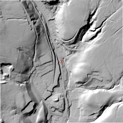 Shaded relief map of the ground around OL128HJ, computed from Environment Agency LiDAR. The ground here sits at about 267 m above sea level and falls 73 m across the surrounding 800 m. Surface water reaching this point runs off ground lying to the north-west, 65.6 m higher.