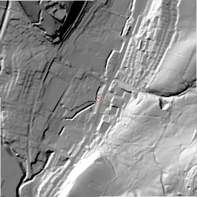 Shaded relief map of the ground around OL128QS, computed from Environment Agency LiDAR. The ground here sits at about 222 m above sea level and falls 93 m across the surrounding 800 m. Surface water reaching this point runs off ground lying to the east-north-east, 56.2 m higher.