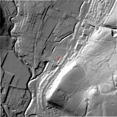 Shaded relief map of the ground around OL128RH, computed from Environment Agency LiDAR. The ground here sits at about 221 m above sea level and falls 74 m across the surrounding 800 m. Surface water reaching this point runs off ground lying to the south, 6.5 m higher.