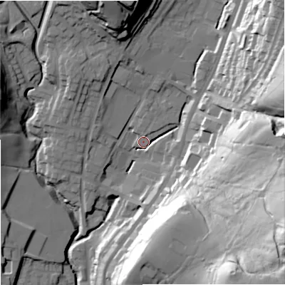 Shaded relief map of the ground around OL128RN, computed from Environment Agency LiDAR. The ground here sits at about 221 m above sea level and falls 72 m across the surrounding 800 m. Surface water reaching this point runs off ground lying to the east-south-east, 64.1 m higher.