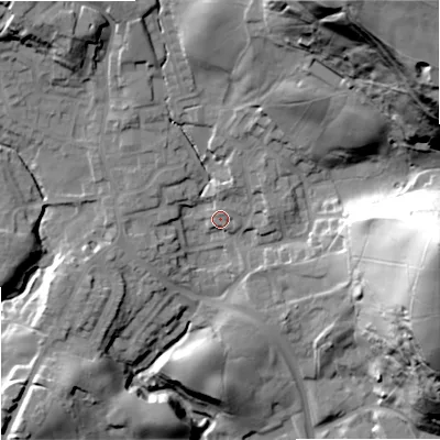 Shaded relief map of the ground around OL129LP, computed from Environment Agency LiDAR. The ground here sits at about 186 m above sea level and falls 91 m across the surrounding 800 m. Surface water reaching this point runs off ground lying to the east-north-east, 3.7 m higher.