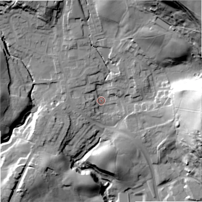 Shaded relief map of the ground around OL129LW, computed from Environment Agency LiDAR. The ground here sits at about 183 m above sea level and falls 83 m across the surrounding 800 m. Surface water reaching this point runs off ground lying to the north-east, 67.2 m higher.