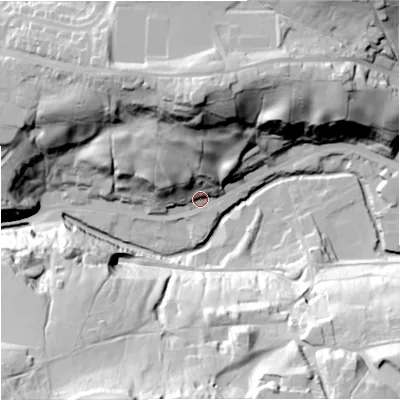 Shaded relief map of the ground around OL130NH, computed from Environment Agency LiDAR. The ground here sits at about 210 m above sea level and falls 65 m across the surrounding 800 m. Surface water reaching this point runs off ground lying to the north, 51.1 m higher.