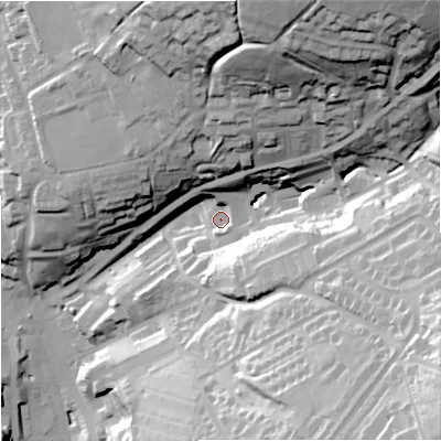 Shaded relief map of the ground around OL139EL, computed from Environment Agency LiDAR. The ground here sits at about 261 m above sea level and falls 69 m across the surrounding 800 m. Surface water reaching this point runs off ground lying to the north-east, 58.1 m higher.