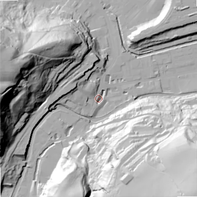Shaded relief map of the ground around OL145AA, computed from Environment Agency LiDAR. The ground here sits at about 128 m above sea level and falls 97 m across the surrounding 800 m. Surface water reaching this point runs off ground lying to the west-north-west, 14.5 m higher.