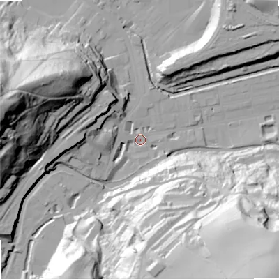 Shaded relief map of the ground around OL145AE, computed from Environment Agency LiDAR. The ground here sits at about 127 m above sea level and falls 97 m across the surrounding 800 m. Surface water reaching this point runs off ground lying to the west, 17.2 m higher.