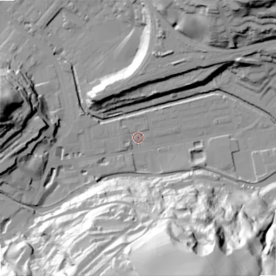 Shaded relief map of the ground around OL145AZ, computed from Environment Agency LiDAR. The ground here sits at about 124 m above sea level and falls 89 m across the surrounding 800 m. Surface water reaching this point runs off ground lying to the north-west, 3.0 m higher.