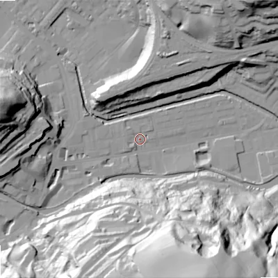 Shaded relief map of the ground around OL145BA, computed from Environment Agency LiDAR. The ground here sits at about 124 m above sea level and falls 89 m across the surrounding 800 m. Surface water reaching this point runs off ground lying to the north-west, 3.0 m higher.