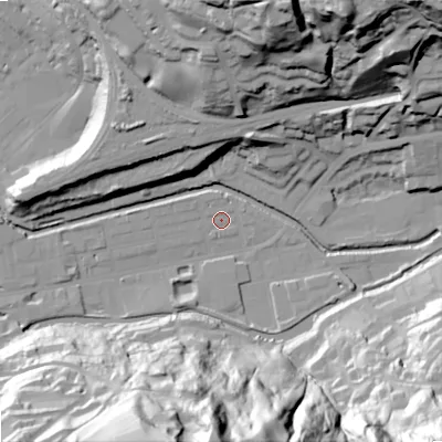 Shaded relief map of the ground around OL145BH, computed from Environment Agency LiDAR. The ground here sits at about 123 m above sea level and falls 84 m across the surrounding 800 m. Surface water reaching this point runs off ground lying to the south, 79.6 m higher.