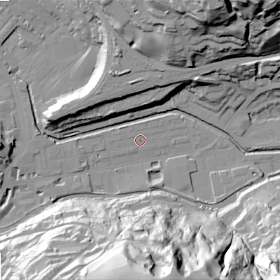 Shaded relief map of the ground around OL145BL, computed from Environment Agency LiDAR. The ground here sits at about 123 m above sea level and falls 84 m across the surrounding 800 m. Surface water reaching this point runs off ground lying to the south, 83.2 m higher.