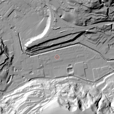 Shaded relief map of the ground around OL145BN, computed from Environment Agency LiDAR. The ground here sits at about 123 m above sea level and falls 85 m across the surrounding 800 m. Surface water reaching this point runs off ground lying to the south, 74.6 m higher.