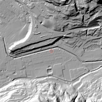 Shaded relief map of the ground around OL145BS, computed from Environment Agency LiDAR. The ground here sits at about 124 m above sea level and falls 85 m across the surrounding 800 m. Surface water reaching this point runs off ground lying to the south, 73.1 m higher.