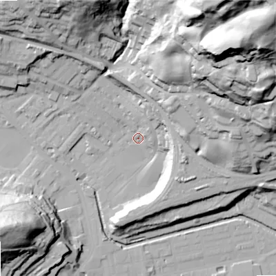 Shaded relief map of the ground around OL145DP, computed from Environment Agency LiDAR. The ground here sits at about 127 m above sea level and falls 99 m across the surrounding 800 m. Surface water reaching this point runs off ground lying to the north-east, 24.0 m higher.