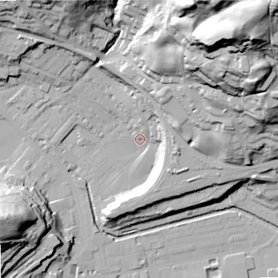 Shaded relief map of the ground around OL145DS, computed from Environment Agency LiDAR. The ground here sits at about 127 m above sea level and falls 110 m across the surrounding 800 m. Surface water reaching this point runs off ground lying to the north-east, 86.6 m higher.