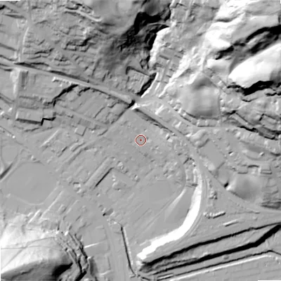 Shaded relief map of the ground around OL145EF, computed from Environment Agency LiDAR. The ground here sits at about 129 m above sea level and falls 117 m across the surrounding 800 m. Surface water reaching this point runs off ground lying to the east-north-east, 17.3 m higher.