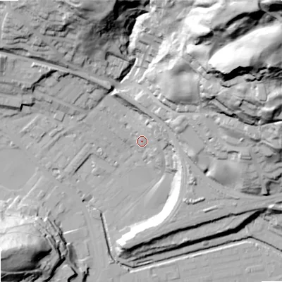 Shaded relief map of the ground around OL145EQ, computed from Environment Agency LiDAR. The ground here sits at about 131 m above sea level and falls 123 m across the surrounding 800 m. Surface water reaching this point runs off ground lying to the north-east, 79.4 m higher.
