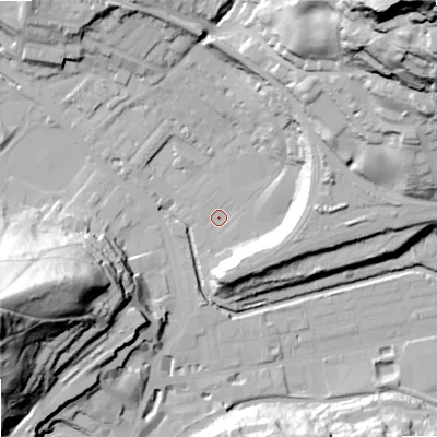 Shaded relief map of the ground around OL145HA, computed from Environment Agency LiDAR. The ground here sits at about 125 m above sea level and falls 90 m across the surrounding 800 m. Surface water reaching this point runs off ground lying to the north-east, 86.1 m higher.
